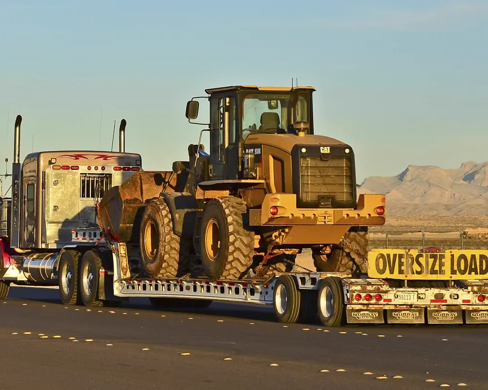 Oversized load on a heavy-haul lowboy trailer